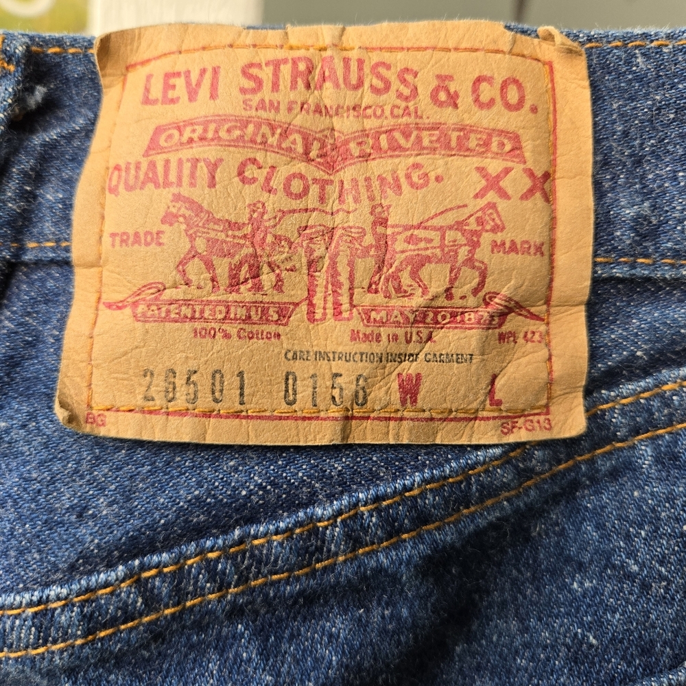 Vintage Levi’s dark wash button fly jeans size 11 26x30 Made In USA